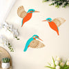 Set of three vintage wooden bird wall decorations in orange and turquoise colors