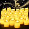 A collection of glowing yellow LED tea light candles arranged in rows against a dark background with sparkling lights and a d