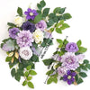 A floral kit featuring dusty rose and blue flowers and eucalyptus greenery for a wedding arch.