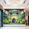 A vibrant football themed birthday backdrop banner featuring trophies, crowns, and soccer balls on a green field.
