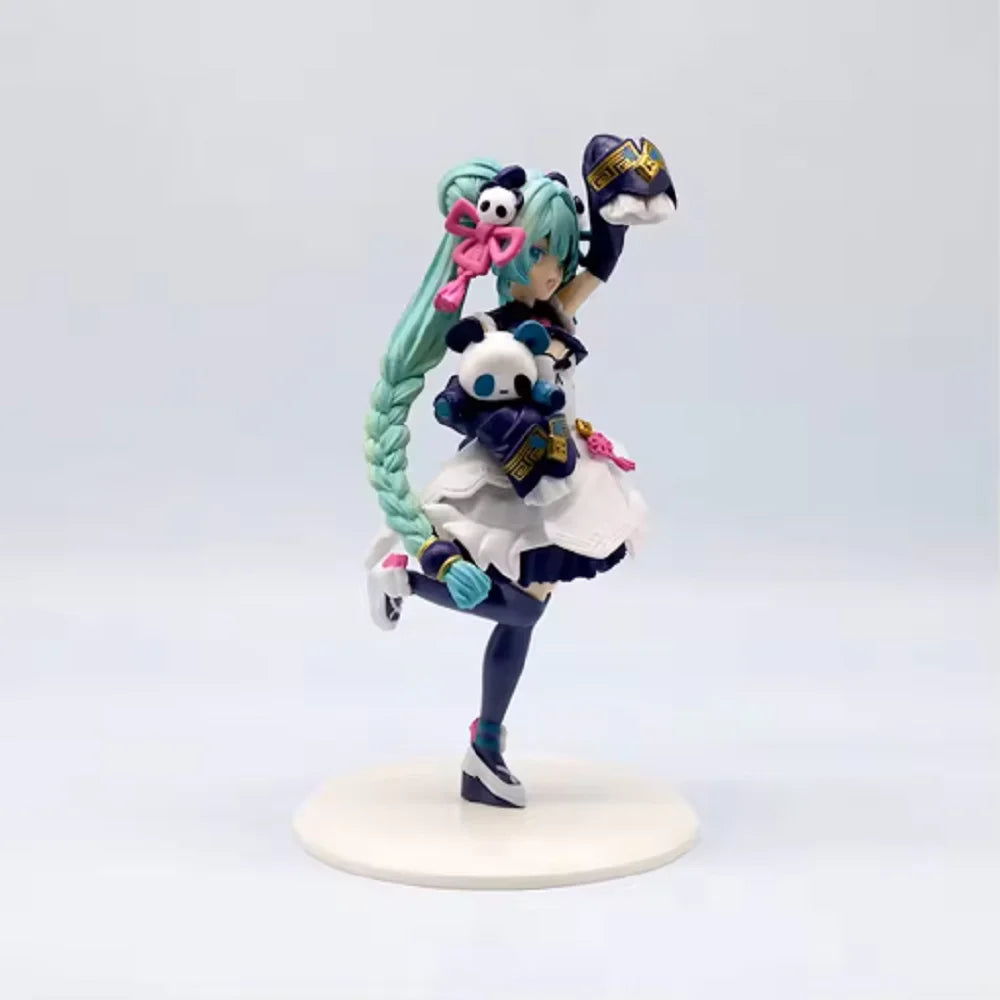 A PVC collectible figurine of Hatsune Miku in a dynamic pose with teal hair and purple accents.