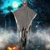 A spooky Halloween decor set featuring a skeleton and ghost hanging from a draped fabric against a dark, moonlit background.
