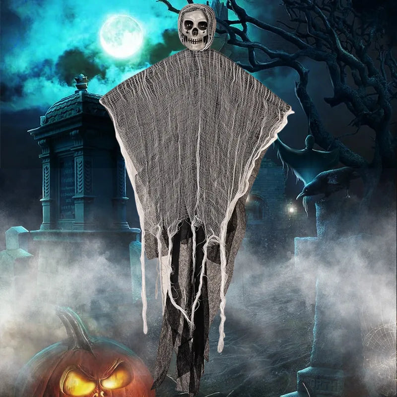 A spooky Halloween decor set featuring a skeleton and ghost hanging from a draped fabric against a dark, moonlit background.