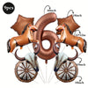 A set of six foil horse number balloons, including a large number and smaller horses, with wooden wheel accents.