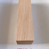 A vertical rectangular block of light-colored natural wood, likely used as a blank for knife handles or DIY projects.