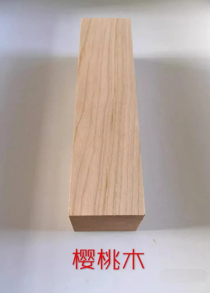 A vertical rectangular block of light-colored natural wood, likely used as a blank for knife handles or DIY projects.