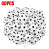 A pile of 60 white oval latex football party balloons