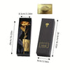 A black gift box containing a metallic gold foil rose flower and a certificate.