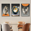 A set of three modern geometric canvas wall art pieces featuring abstract, curved shapes in silver, gold, and blue tones.