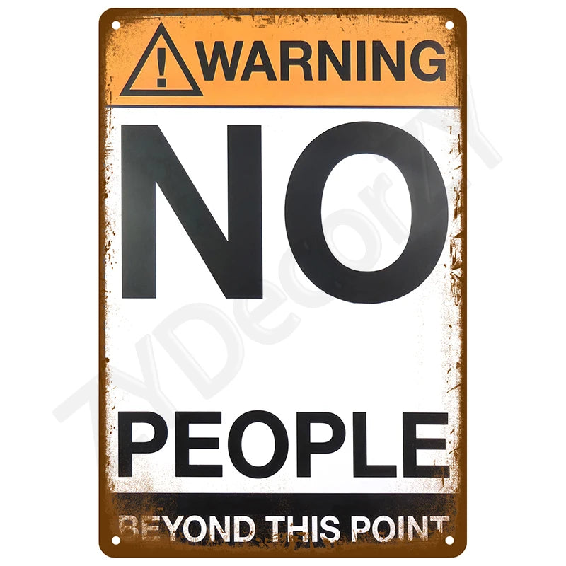 A vintage warning sign with a yellow triangle and black text that reads WARNING NO PEOPLE BEYOND THIS POINT.