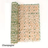 A roll of artificial cherry blossom privacy fence screen material.