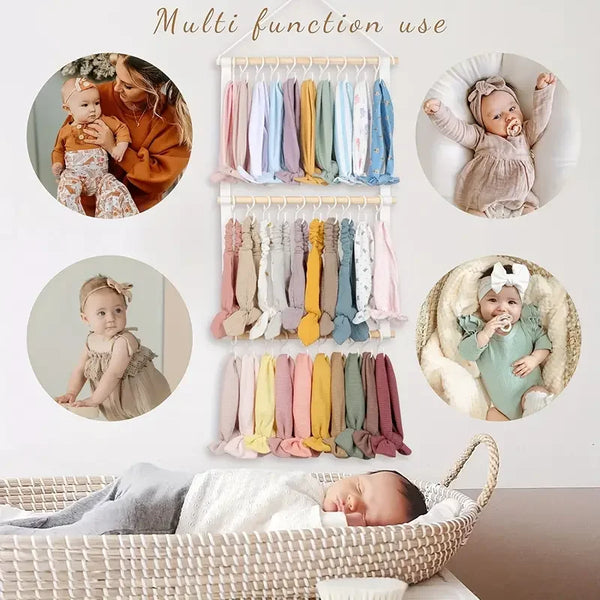 Wall-mounted headband holder for girls showing various colored hair accessories and baby products