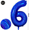 A large, shiny blue foil number balloon shaped like the number 6 for birthday and party decoration.