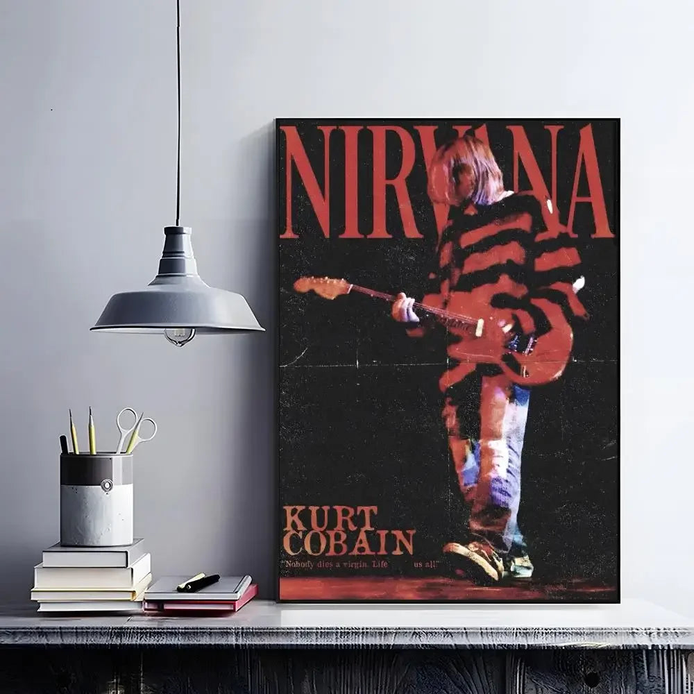 A vertical poster featuring the word NIRVANA and a silhouette of Kurt Cobain playing a guitar in grunge style.