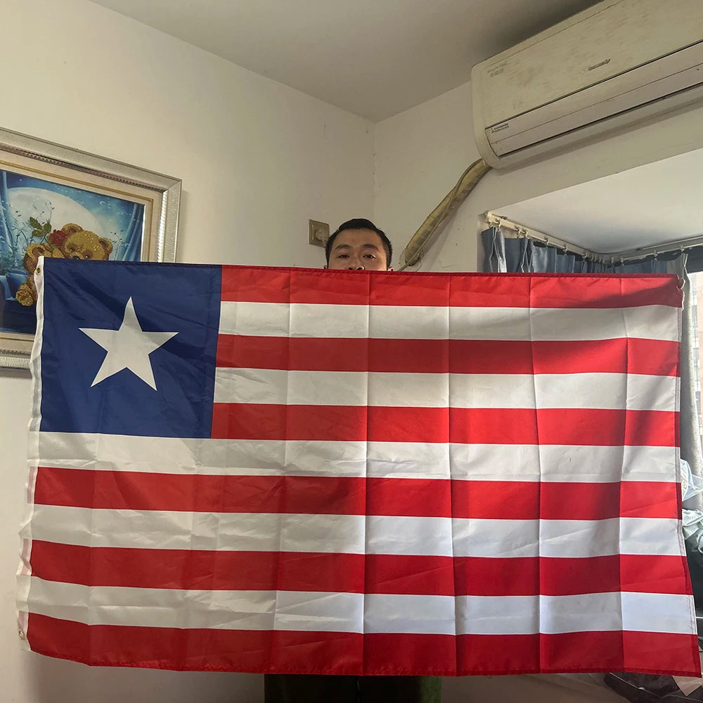 A decorative banner displaying the flag of Liberia with red and white stripes and a blue canton.
