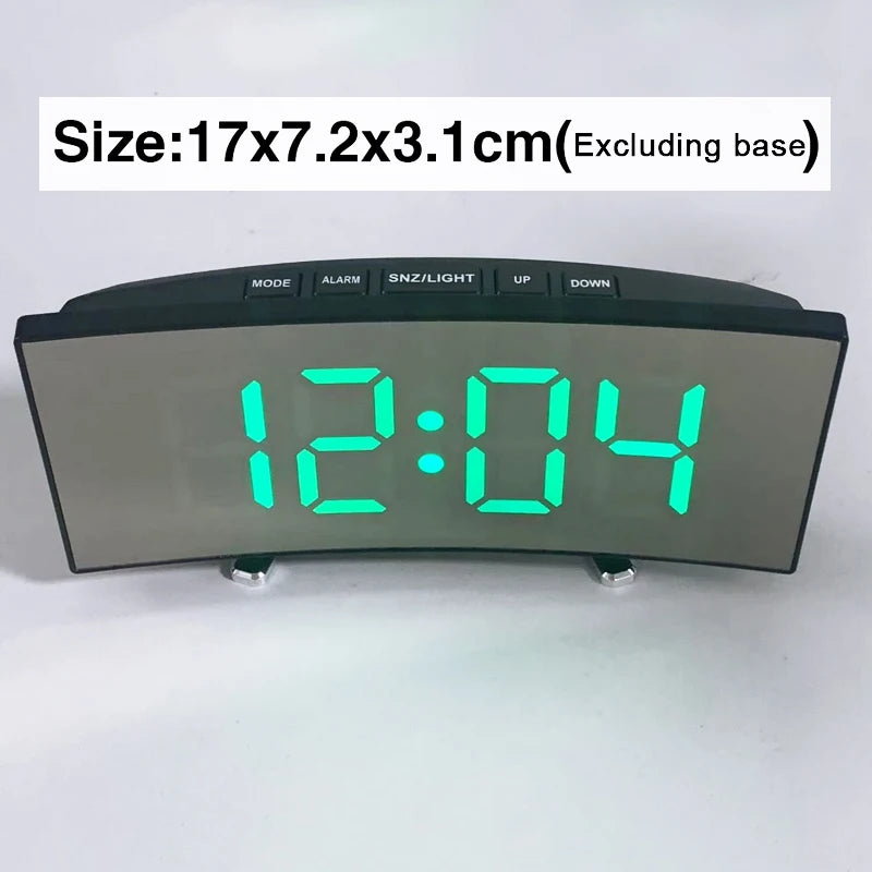 A digital LED alarm clock displaying 12:04 on a dark gray screen with control buttons.