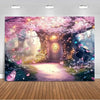 A vibrant photo backdrop featuring a pink cherry blossom tree, glowing lights, and a wooden door surrounded by purple and pin