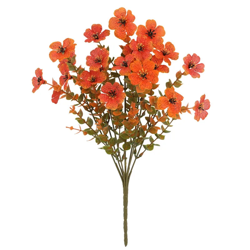 A spray of vibrant orange artificial pansy flowers on a green stem.