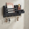 A dark gray wall-mounted organizer for mail and keys featuring a storage tray and a small drawer.
