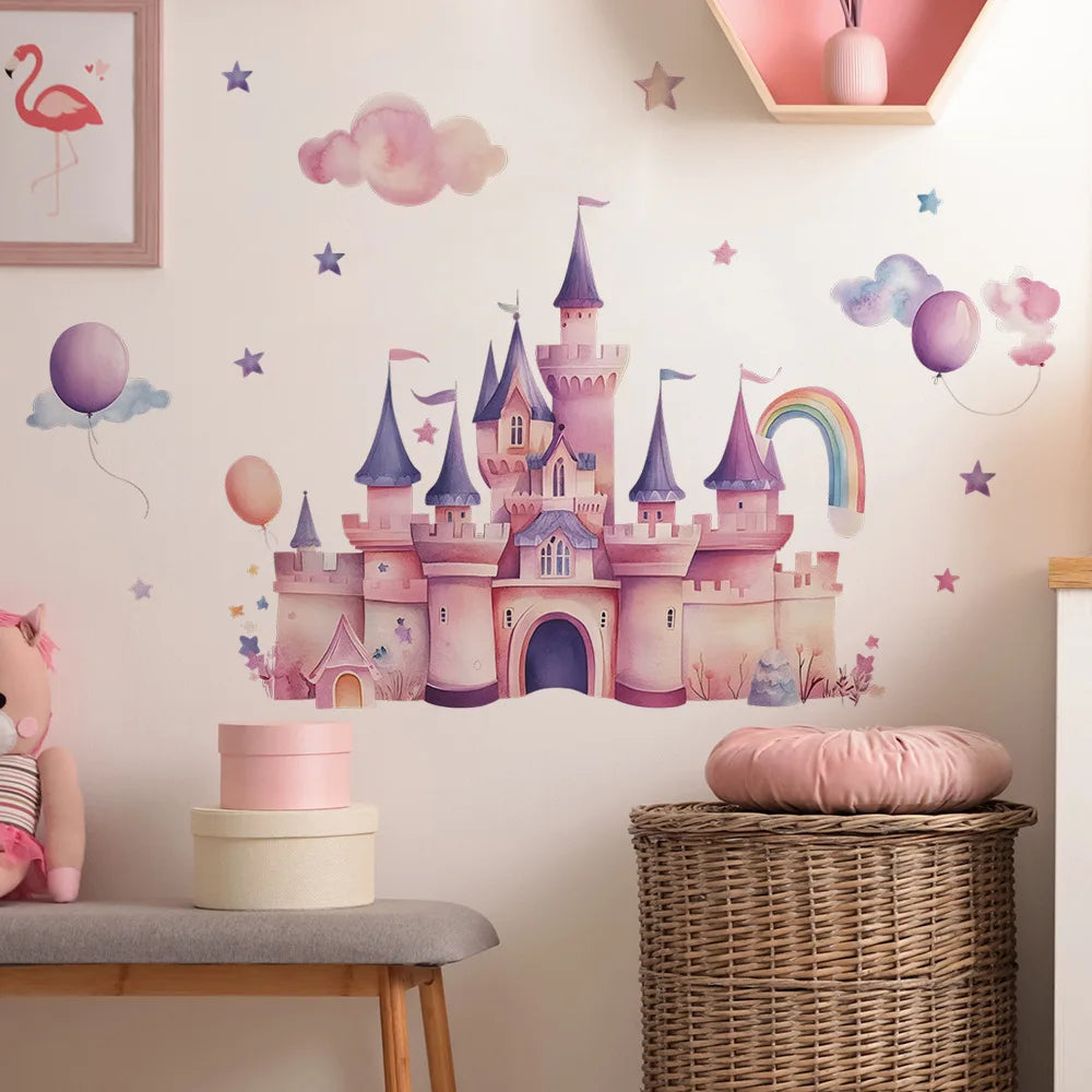 Wall decals featuring a pink castle and clouds on a white wall with pastel accents.