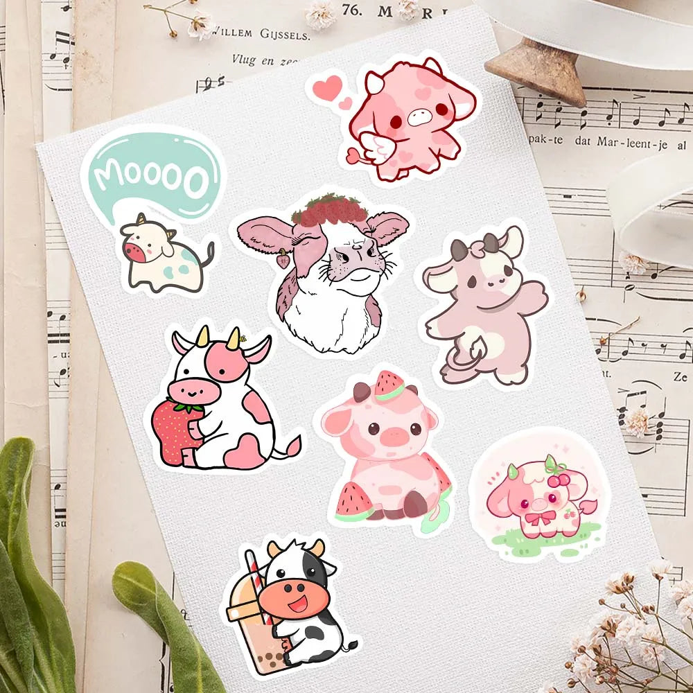 A sheet of white stickers featuring various cute pink and white cow cartoon designs.