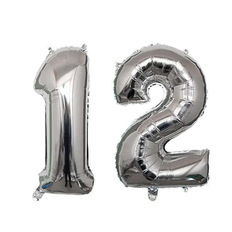 Silver foil number balloons shaped like the numbers 1 and 2
