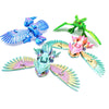 A set of three articulated 3D printed owl figurines in blue, green, and pink hues.