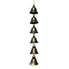 A hanging wind chime made of multiple small metal bells.