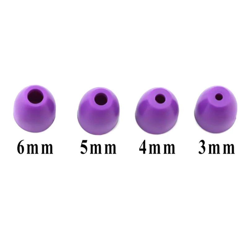 A set of purple silicone pearl balls with diameters ranging from 6mm down to 3mm for fondant and cake decorating.