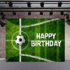A vibrant green soccer field backdrop with a white goal and the text HAPPY BIRTHDAY displayed on the grass.
