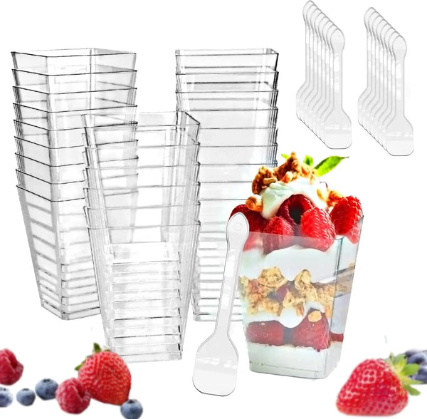 Clear reusable plastic dessert cups with spoons for serving parfaits and party treats