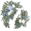 A floral kit featuring dusty rose and blue eucalyptus greenery and flowers for a wedding arch.