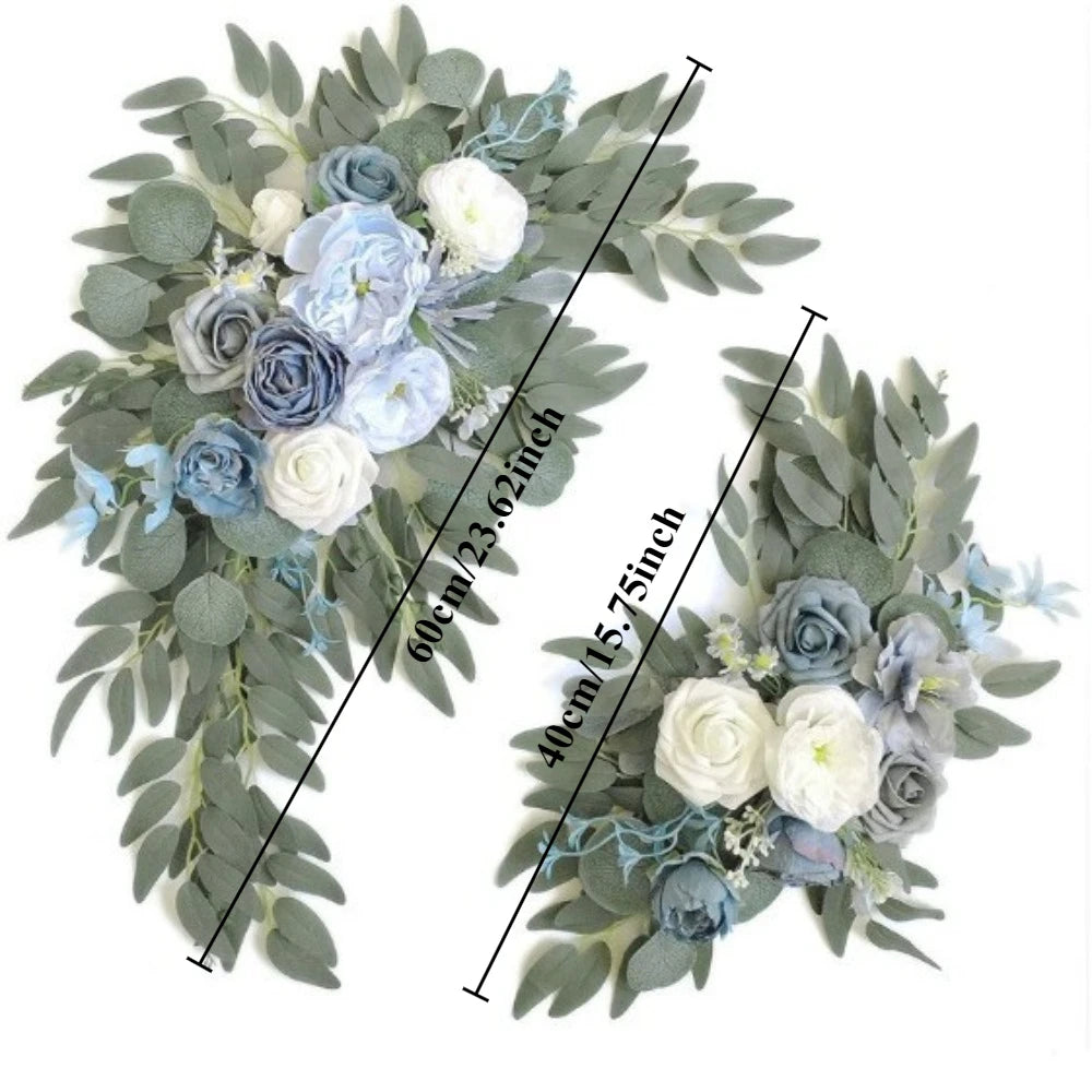 A floral kit featuring dusty rose and blue eucalyptus greenery and flowers for a wedding arch.