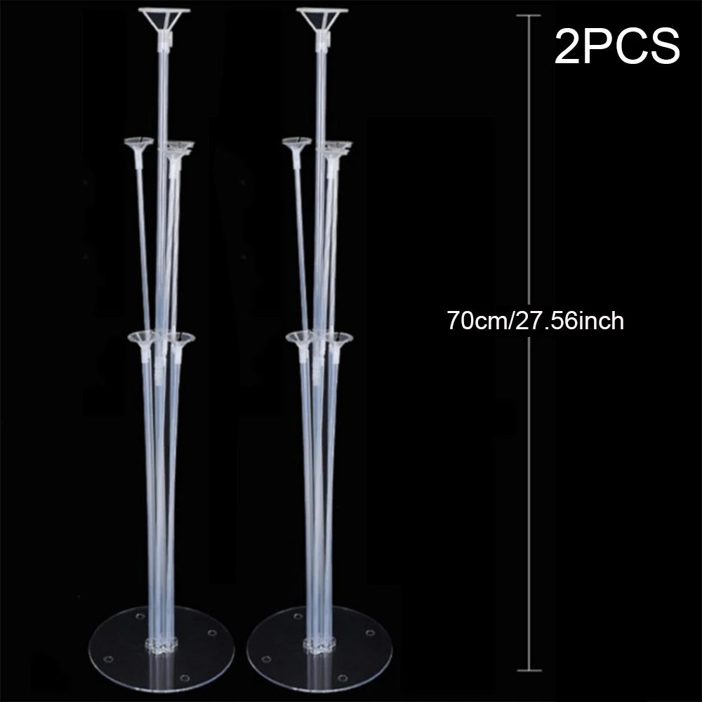 Two clear acrylic balloon column stands with a 70cm height for events