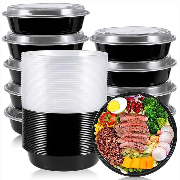 A stack of round black meal prep containers with clear lids and one open container filled with various healthy ingredients.