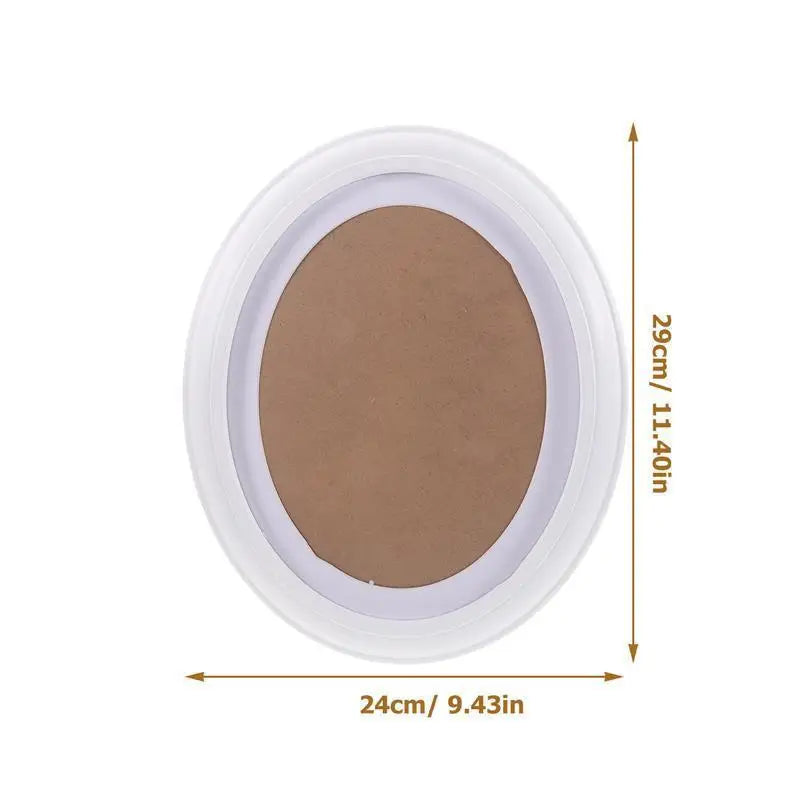 Elegant oval wooden wall photo frame with a light brown color and white border