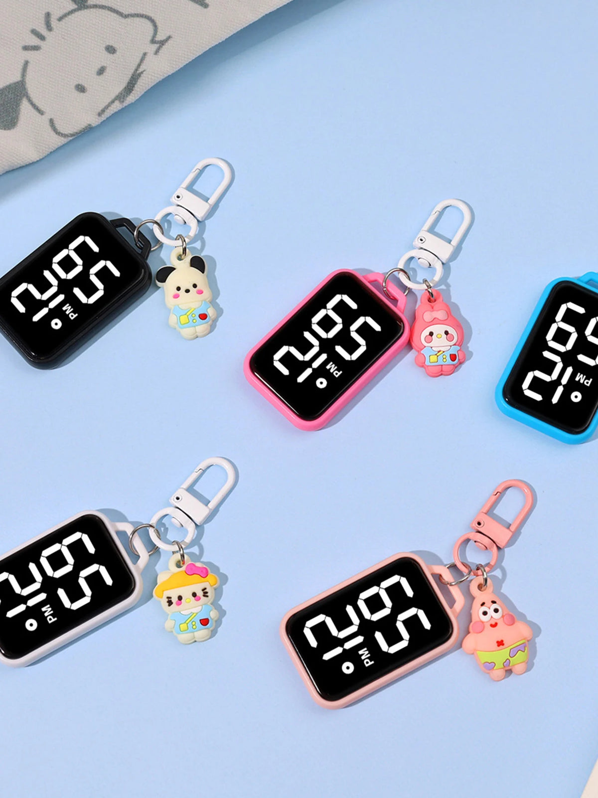 Pink and black LED keychain pocket watches with digital displays featuring cute animal charms
