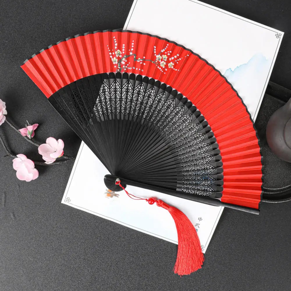 Traditional Bamboo Folding Fan with Solid Color Design