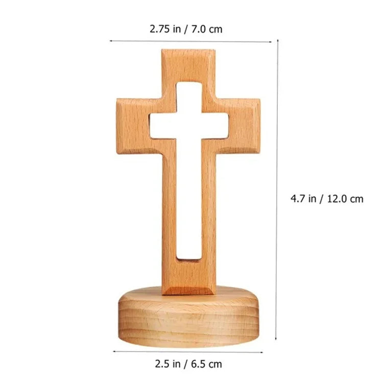 A wooden crucifix wall ornament with a cross mounted on a circular base.