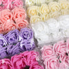A collection of artificial foam roses in various shades of pink, purple, and white arranged in clear packaging.