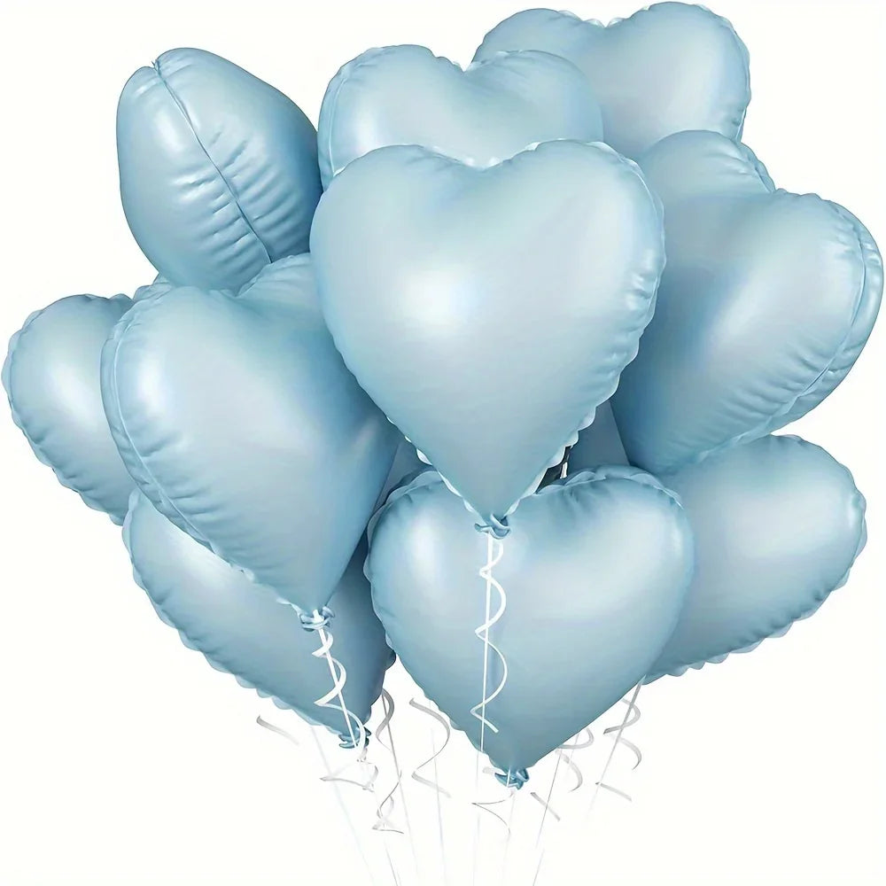 A cluster of ten light blue heart-shaped foil balloons tied together for a celebration.