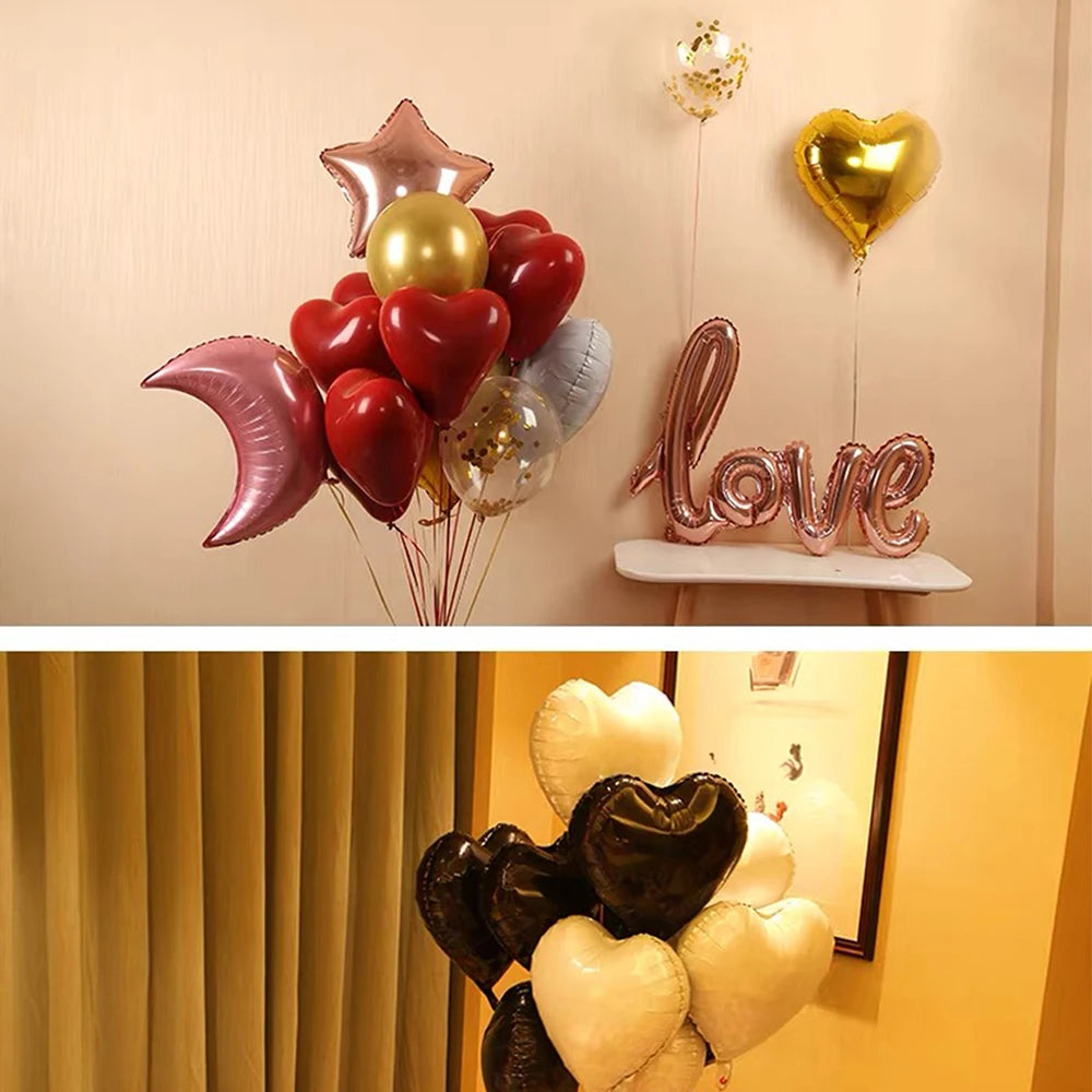 A display of various glitter curling ribbon rolls in shades of pink, red, gold, and silver shaped like hearts and stars for g