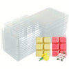 A stack of clear plastic clamshell molds for DIY wax melts, with samples of yellow and pink wax visible.