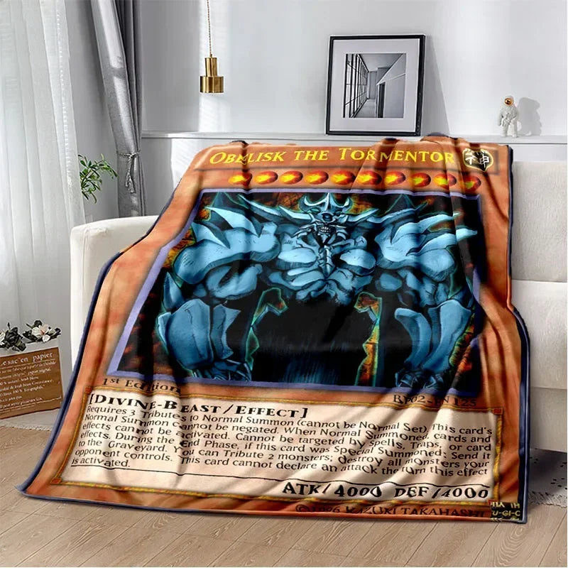 A throw blanket featuring a Blue-Eyes White Dragon illustration for Yu-Gi-Oh!