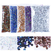 A collection of various colored resin rhinestones and glitter for crafting projects.