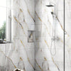 White marble peel-and-stick wall panels featuring gold veining in a modern bathroom setting