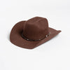 A brown wool cowboy hat with a studded leather band shown from above.