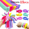 A set of 15 colorful unicorn-themed stretch sensory fidget toys for play
