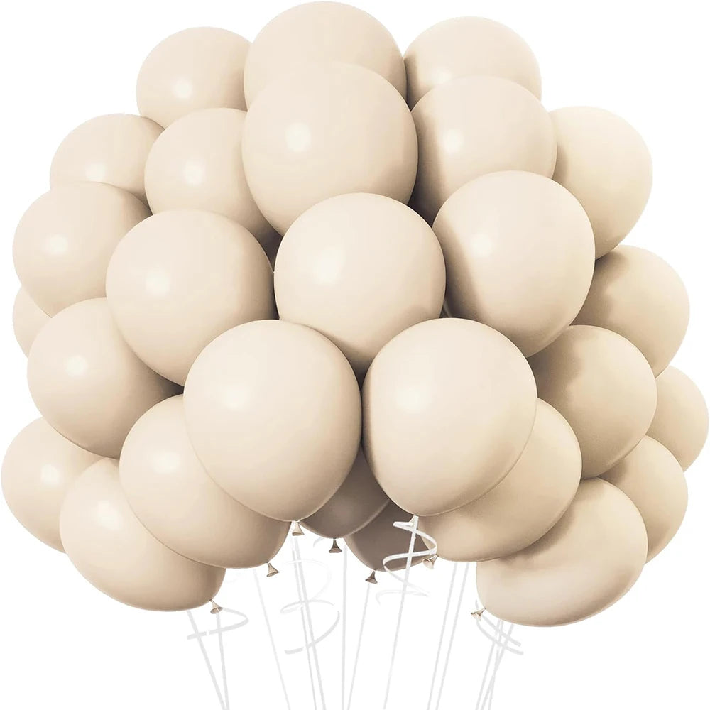 A bunch of light beige latex balloons tied together, ready for parties or events.