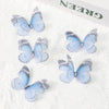 A set of light blue and gray 3D embroidered butterfly patches for crafts and decor